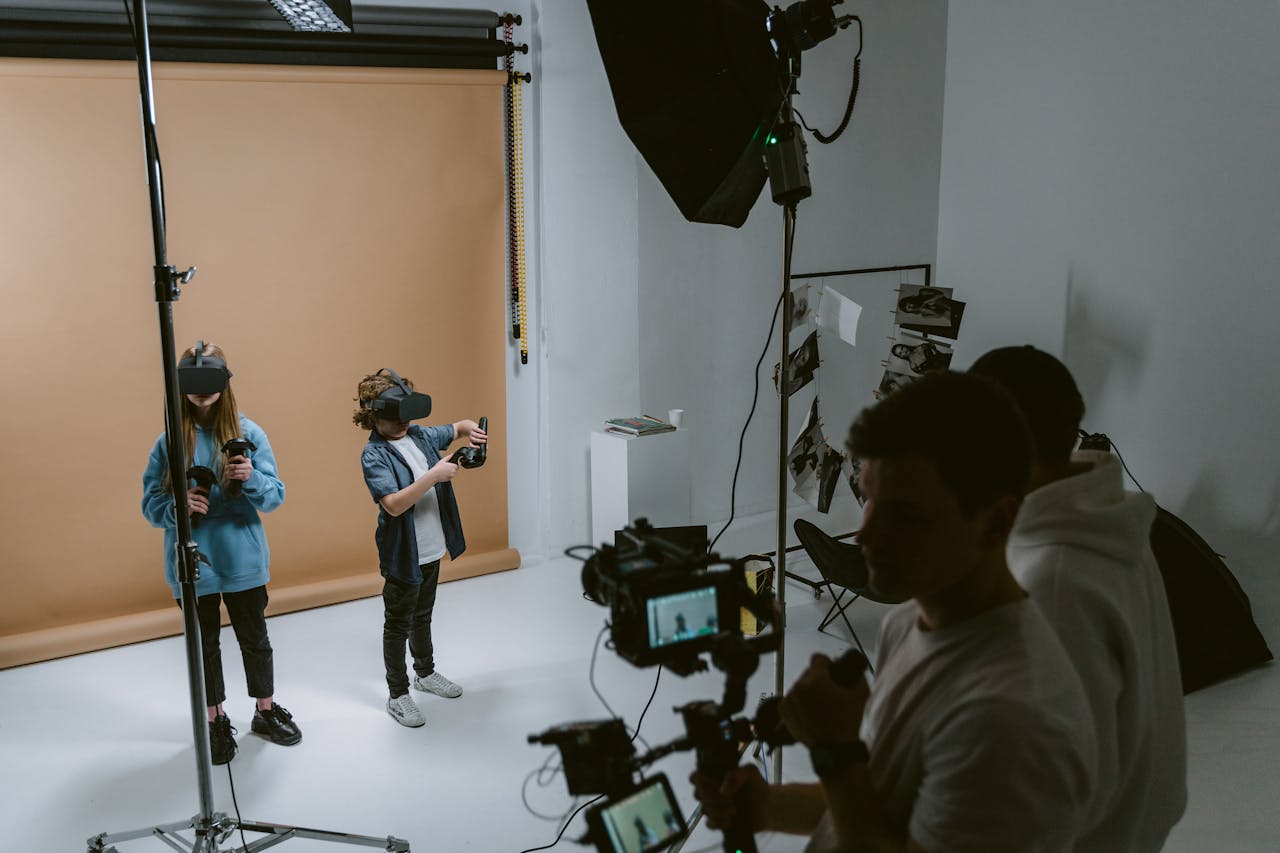 Services Children exploring virtual reality in a professional photo studio setting.